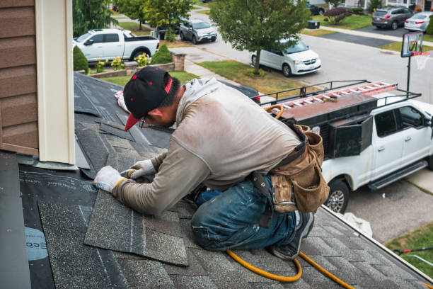 Professional Roof Repair technician working in Newton Highlands, MA